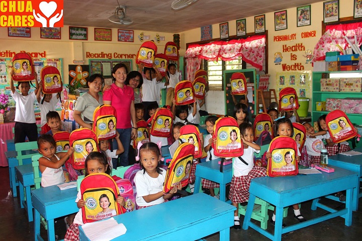 Distribution of school bags and vitamins